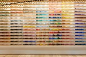 a wall of colorful pigments