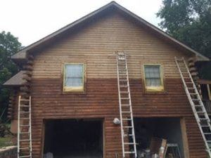 staining a log home
